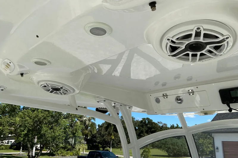 Slide: The Image of 2019 Sportsman Open 312 Center Console boat speakers and ceiling detail. - 48