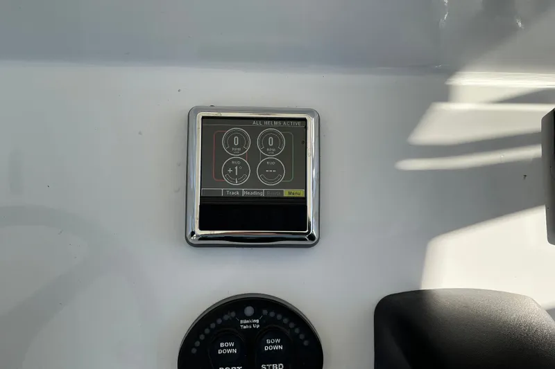 Slide: The Image of Control panel of a 2019 Sportsman Open 312 Center Console boat. - 51