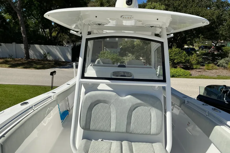 Slide: The Image of 2019 Sportsman Open 312 Center Console boat with seating and console view. - 29