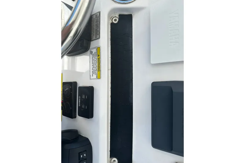 Slide: The Image of Control panel of 2016 Regulator 28 Forward Seating boat with Yamaha components. - 16