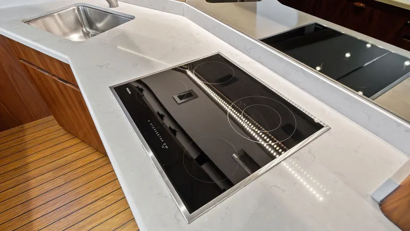 Slide: The Image of Galley with Modern Cooktop - 9