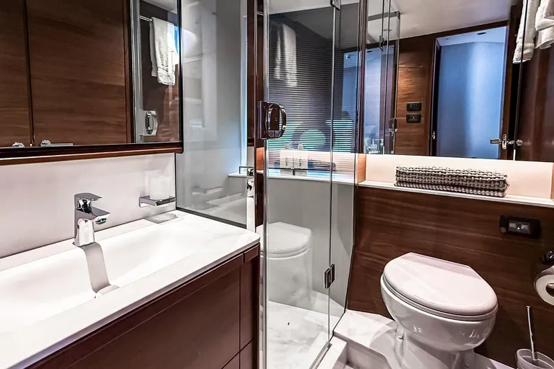 Slide: The Image of Luxurious bathroom in 2026 Princess S65 Sportbridge yacht with modern fixtures and elegant design. - 66