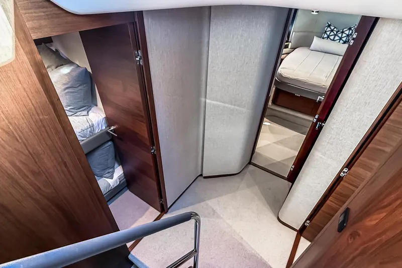 Slide: The Image of Interior of 2026 Princess S65 Sportbridge yacht with luxurious cabins and modern design. - 44