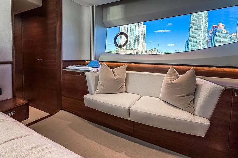 Slide: The Image of Luxurious interior of 2026 Princess S65 Sportbridge yacht with cityscape view. - 49