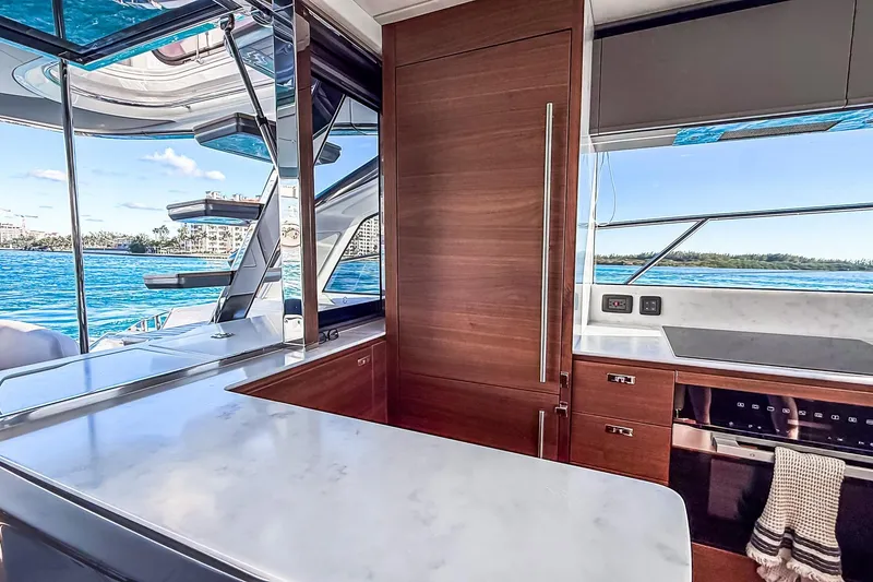 Slide: The Image of Luxurious interior of 2026 Princess S65 Sportbridge yacht with ocean view. - 20