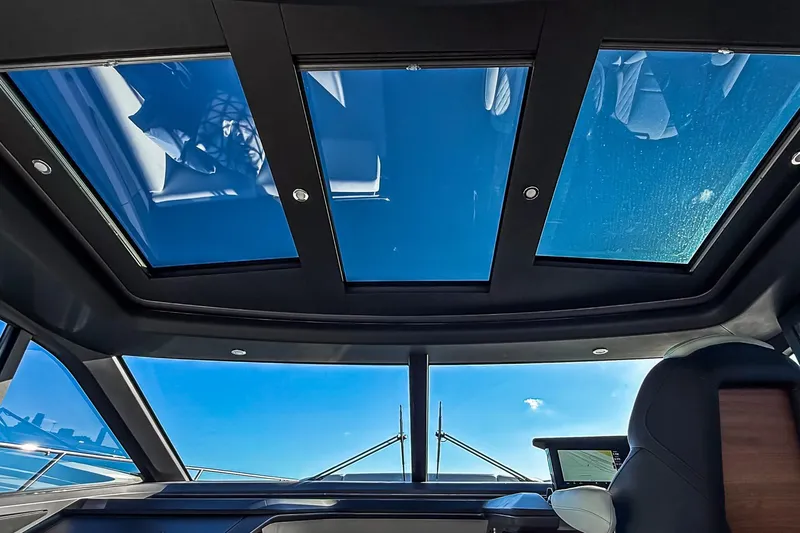 Slide: The Image of Interior view of 2026 Princess S65 Sportbridge yacht with panoramic sunroof. - 36