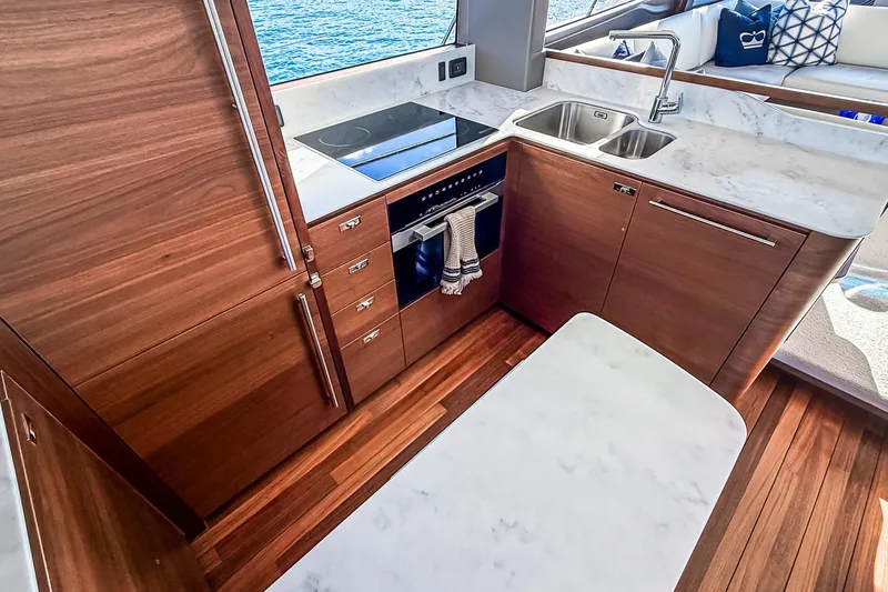 Slide: The Image of Luxurious kitchen interior of 2026 Princess S65 Sportbridge yacht with modern appliances. - 23