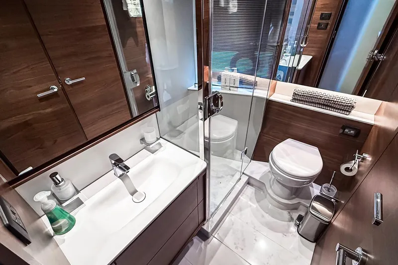 Slide: The Image of Luxurious bathroom in 2026 Princess S65 Sportbridge yacht, featuring modern fixtures and elegant design. - 67