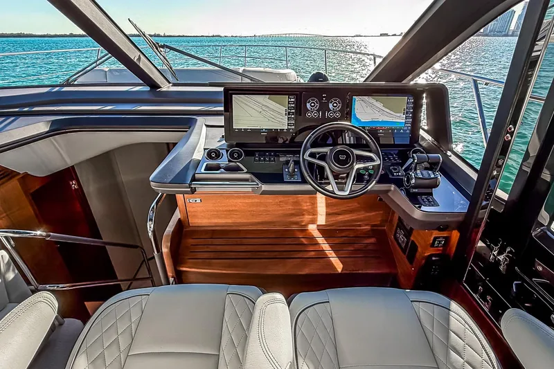 Slide: The Image of Luxurious helm of 2026 Princess S65 Sportbridge yacht with advanced navigation systems. - 33