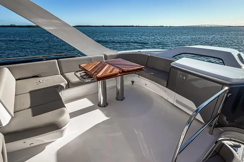 Slide: The Image of Luxurious 2026 Princess S65 Sportbridge yacht deck with elegant seating and ocean view. - 88