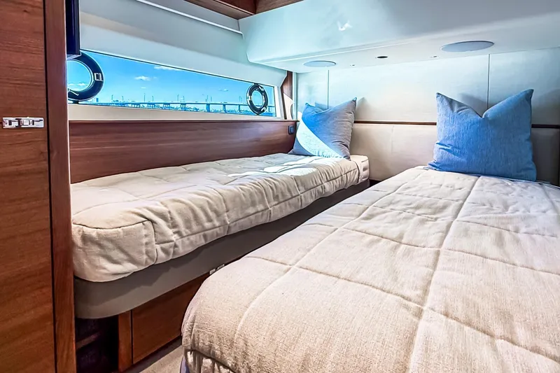 Slide: The Image of Luxurious twin cabin interior of 2026 Princess S65 Sportbridge yacht. - 60