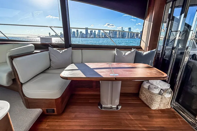 Slide: The Image of Luxurious interior of 2026 Princess S65 Sportbridge yacht with city skyline view. - 42
