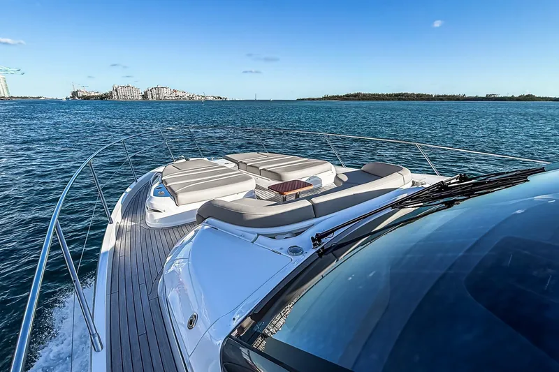 Slide: The Image of Luxurious 2026 Princess S65 Sportbridge yacht cruising on open water. - 75
