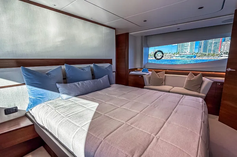 Slide: The Image of Luxurious bedroom interior of 2026 Princess S65 Sportbridge yacht with ocean view. - 48