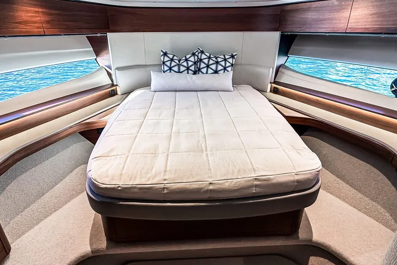 Slide: The Image of Luxurious bedroom interior of 2026 Princess S65 Sportbridge yacht with elegant bedding. - 53