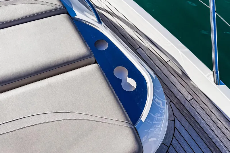 Slide: The Image of Luxurious deck seating on 2026 Princess S65 Sportbridge yacht with elegant wood finish. - 83