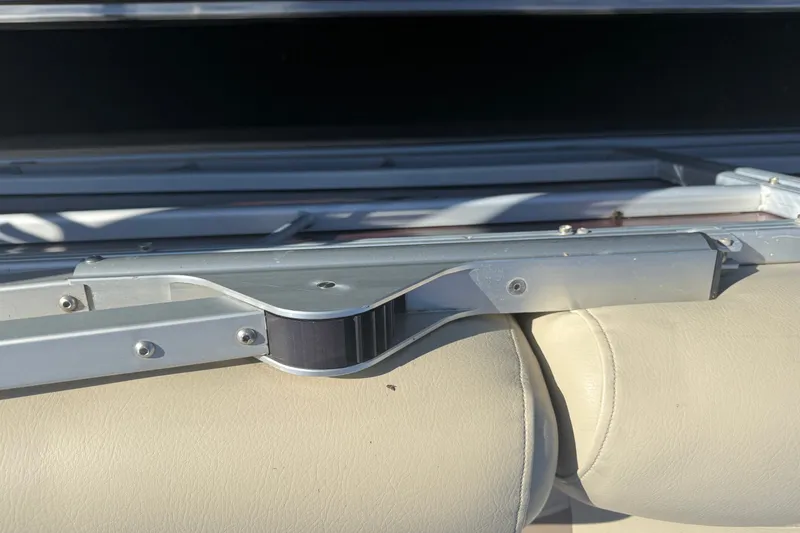 Slide: The Image of Close-up of Sweetwater 22 boat seat frame, 2018 model, with beige upholstery. - 15
