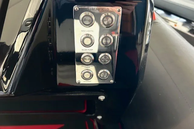 Slide: The Image of Control panel of 2026 Highfield Velox 560 boat with labeled buttons. - 10