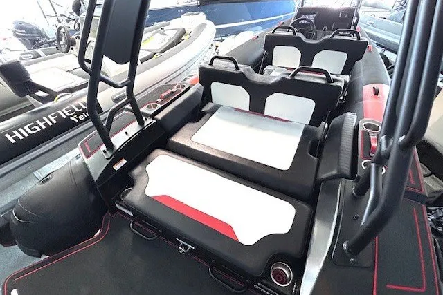 Slide: The Image of 2026 Highfield Velox 560 boat interior with modern seating and sleek design. - 3
