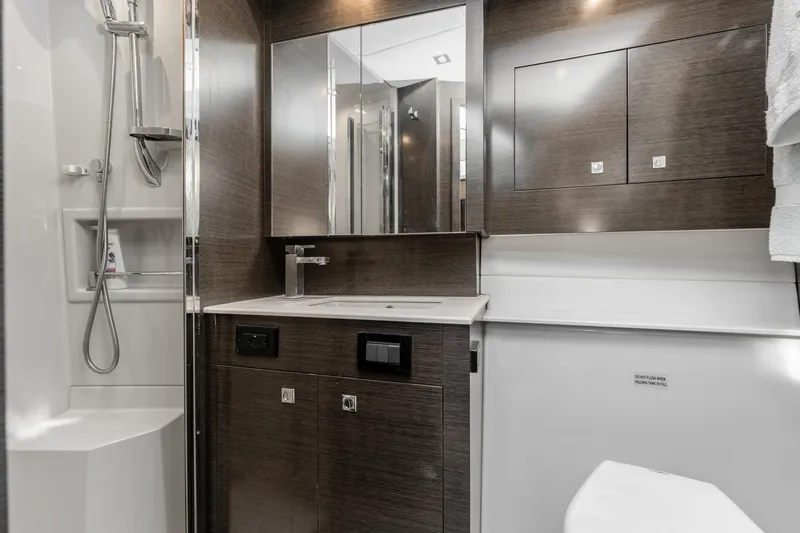 Slide: The Image of Luxurious bathroom in 2018 Cruisers Yachts 50 Cantius with modern fixtures and sleek design. - 19