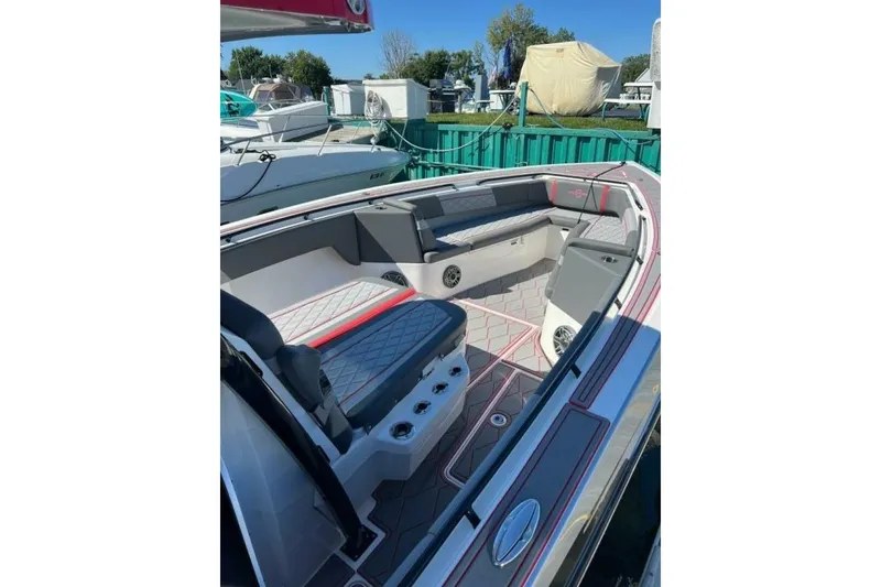 Slide: The Image of 2022 Fountain 38 SC boat interior with sleek seating and modern design. - 4