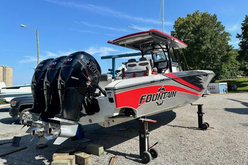 Slide: The Image of 2022 Fountain 38 SC boat with triple Mercury 400 engines on display. - 12