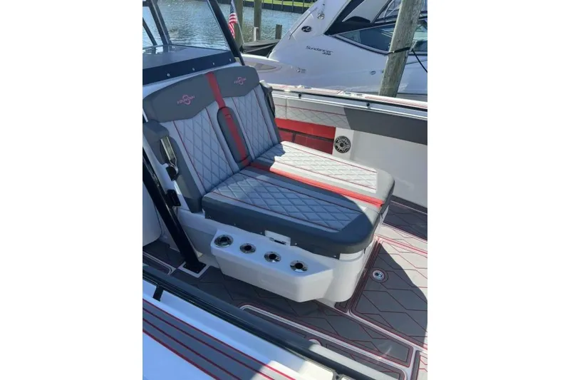Slide: The Image of 2022 Fountain 38 SC boat interior with stylish seating and modern design. - 6