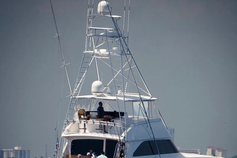 The Image of 2001 Viking 61 Convertible yacht with tall tower and radar equipment. - 0