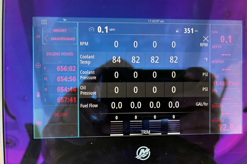 Slide: The Image of Dashboard display of a 2024 Caymas 401 CC boat showing engine metrics and coolant temperature. - 10