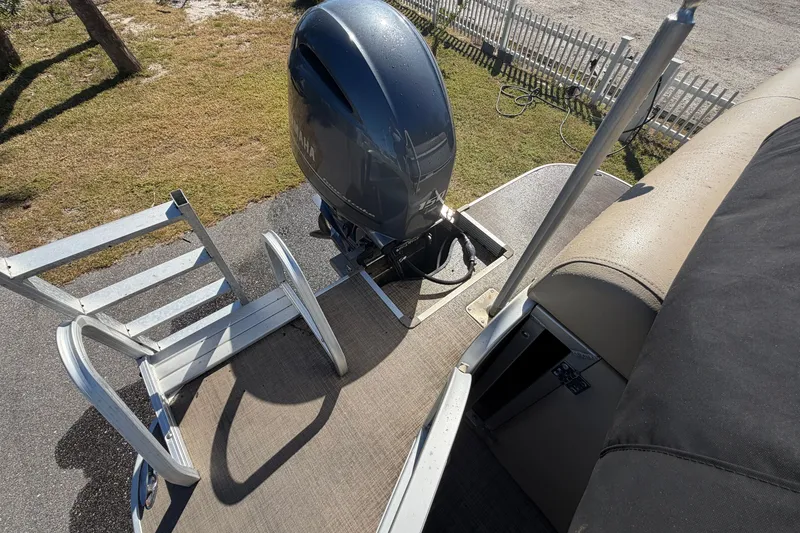 Slide: The Image of 2020 SunCatcher V322C boat with Yamaha outboard motor and boarding ladder. - 22
