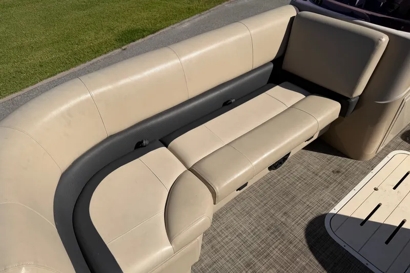 Slide: The Image of Beige seating area on 2020 SunCatcher V322C boat, featuring comfortable upholstery. - 10