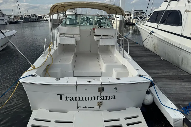 Slide: The Image of 2000 Mainship Pilot 30 boat docked in Charleston, SC marina. - 1