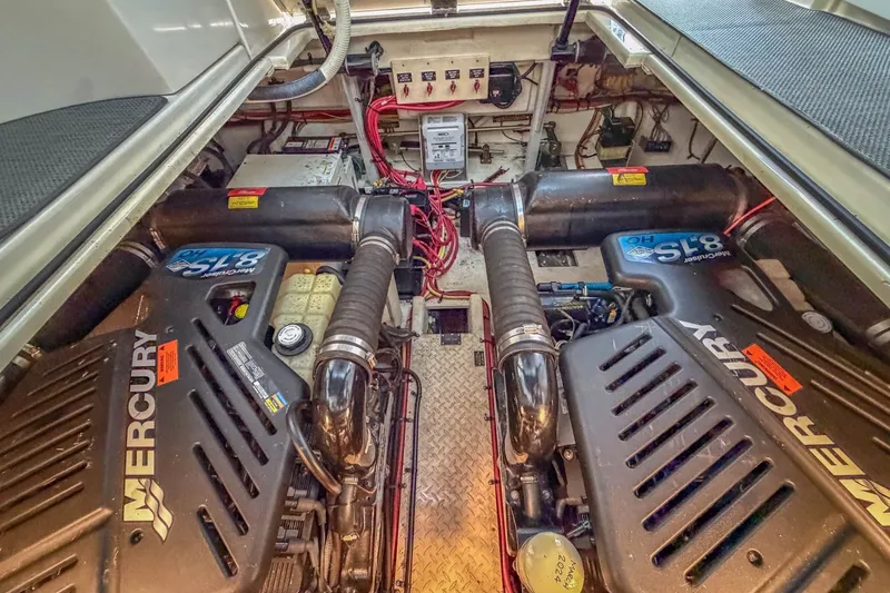 Slide: The Image of Engine room of 2005 Cruisers Yachts 370 Express with dual Mercury engines. - 24