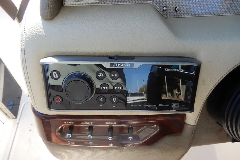 Slide: The Image of Fusion stereo system on 2013 Regal 24 FasDeck boat dashboard. - 11