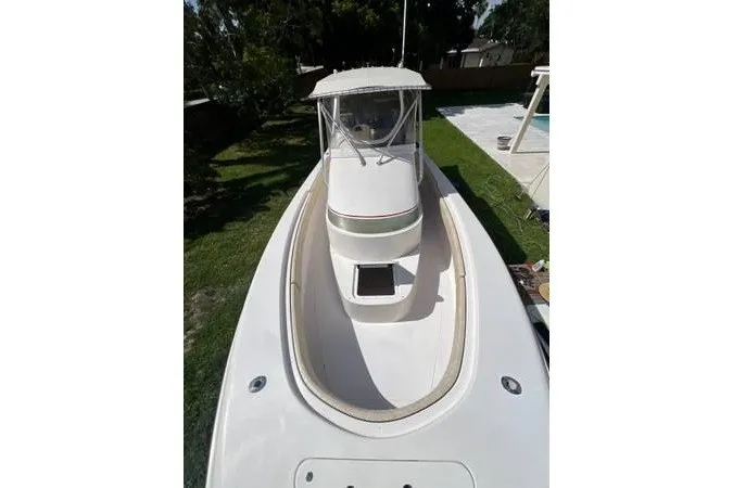 Slide: The Image of 2004 Contender 31 Fisharound boat with spacious deck and cabin, viewed from above. - 4