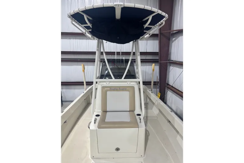 Slide: The Image of 1982 Shamrock 170 Center Console boat with T-top in storage facility. - 6