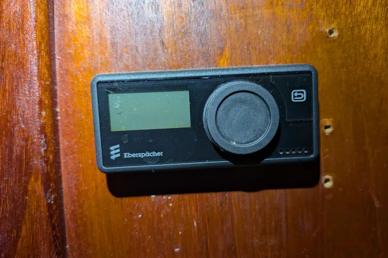 Slide: The Image of Eberspächer control panel on wooden surface, Custom 43 Pilothouse Trawler, 1981 model. - 66
