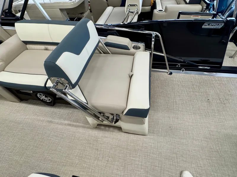Slide: The Image of The interior of the 2025 Tahoe Cascade 2385 QLS features a luxurious bench seat with blue and white upholstery. - 17
