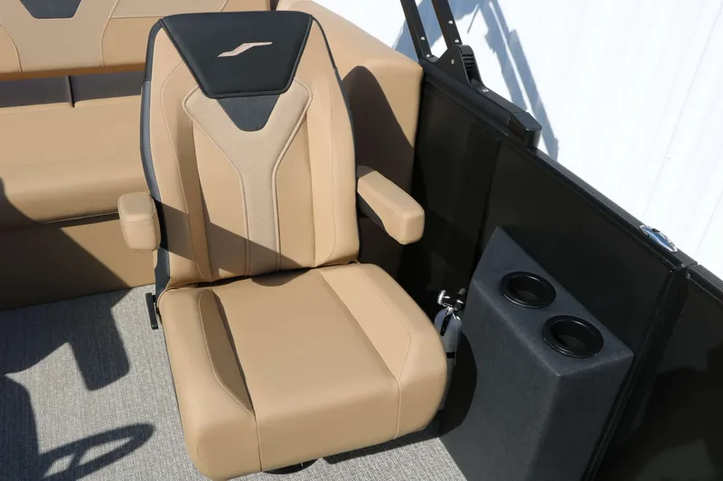 Slide: The Image of Beige captain's chair with armrests and cup holders on a boat. - 39