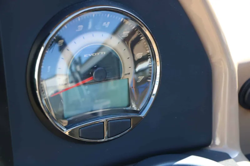 Slide: The Image of Close-up of a speedometer with Evotti logo on a boat. - 47