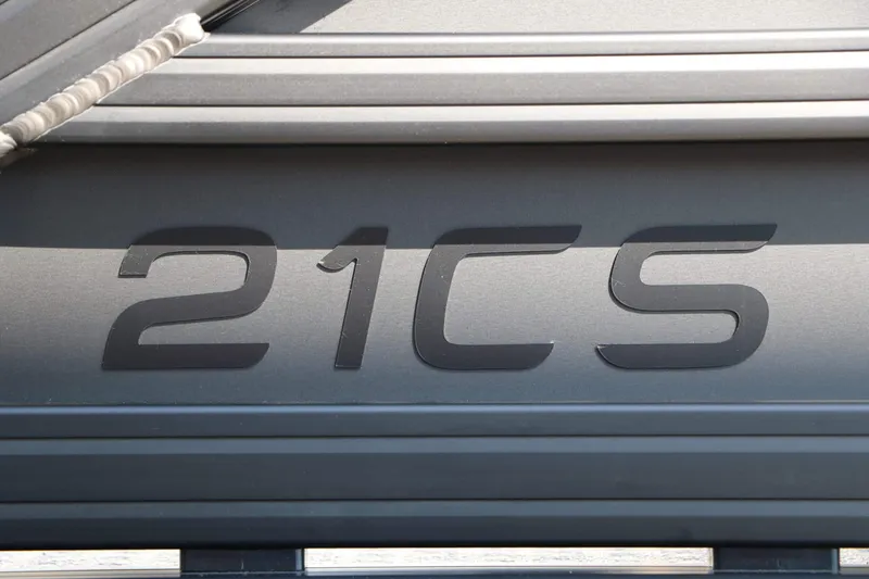 Slide: The Image of Close-up of the "21CS" lettering on a boat. - 17