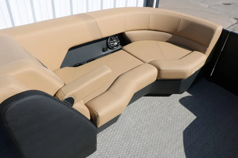 Slide: The Image of The image shows a luxurious, beige upholstered seating area on a boat. - 31