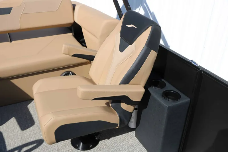 Slide: The Image of Comfortable captain's chair with armrests and cup holders on a modern boat. - 41