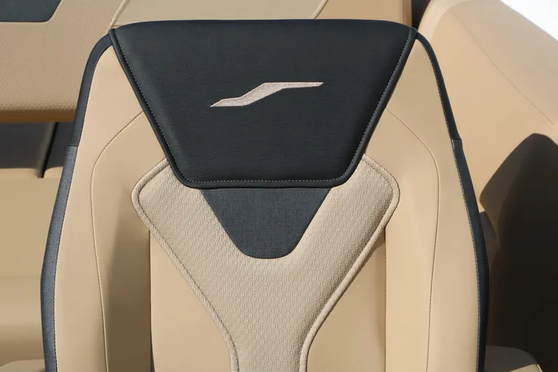 Slide: The Image of Close-up of a luxurious boat seat with beige and black upholstery. - 40