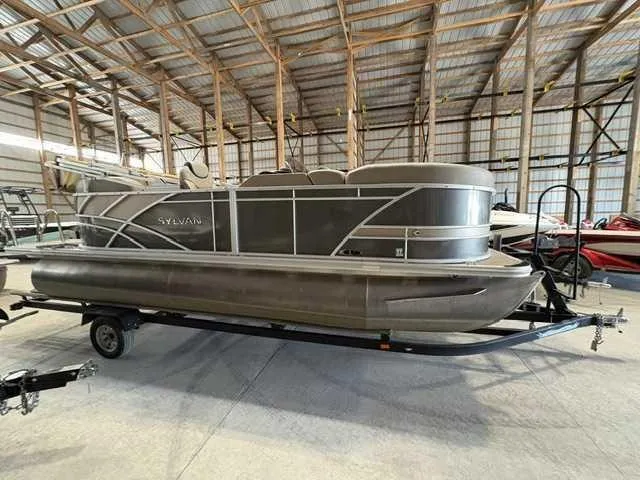 The Image of Sylvan 2Toon L1-LZ 2022 on a trailer in a storage facility. - 0