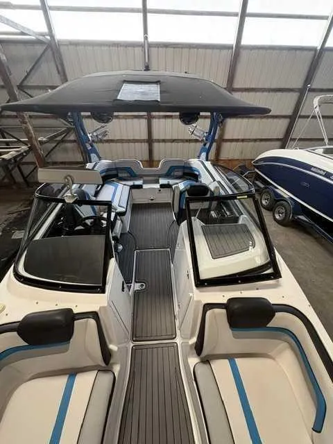 Slide: The Image of 2018 Yamaha 242X in a warehouse. It features a modern design with blue accents. - 8