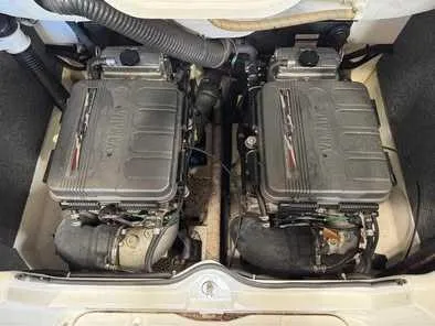 Slide: The Image of Two engines in a boat's engine compartment, clean and well-maintained. - 2