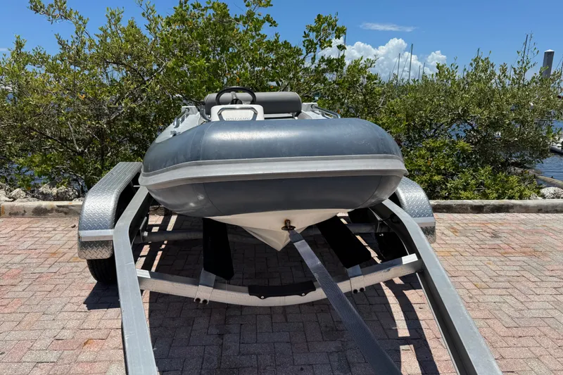 Slide: The Image of 2019 Williams Jet Tenders Sportjet 345 on trailer, parked outdoors. - 5
