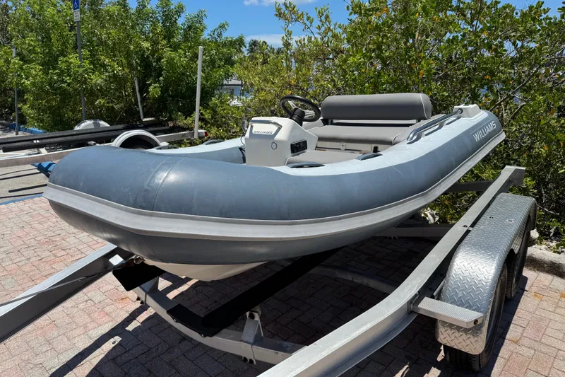 Slide: The Image of 2019 Williams Jet Tenders Sportjet 345 on trailer, parked outdoors. - 4