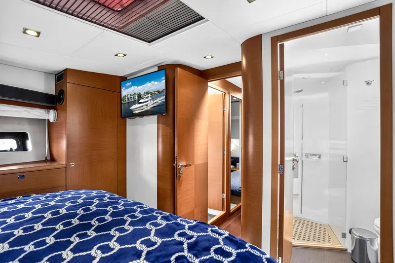 Slide: The Image of Luxurious interior of 2013 Prestige 620 yacht with bedroom and ensuite bathroom. - 51